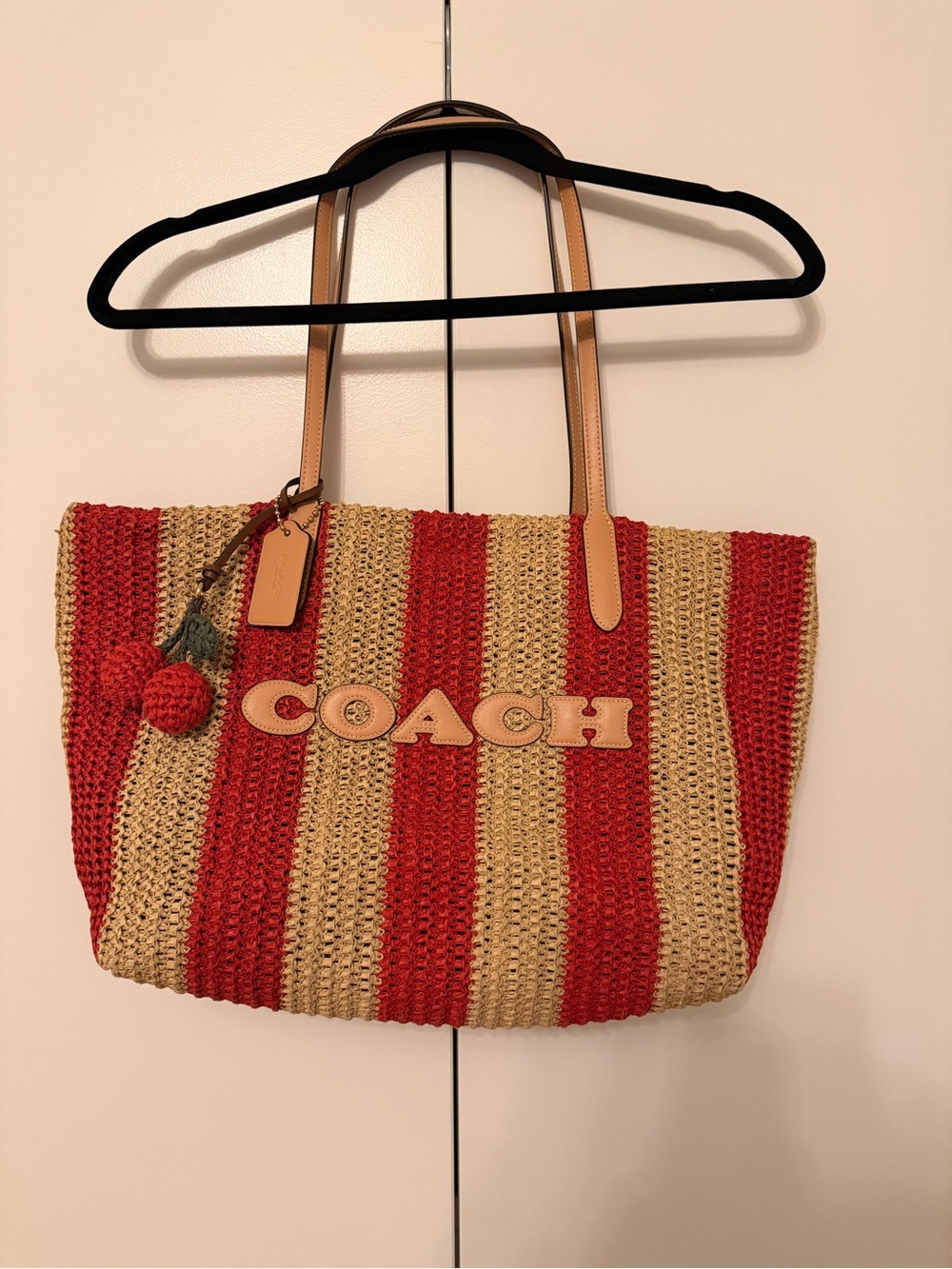 Coach Red and Tan Striped Raffia Tote with Leather Handles and Pom Charm